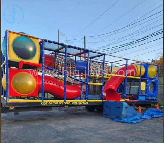 Movable playground with trailer